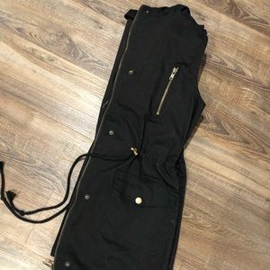 Brand new black zip vest